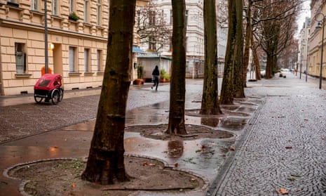 A lone jogger in a deserted street in Berlin’s Schoeneberg district