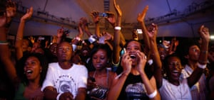 Fans cheer rapper The Game at the Mamas, the inaugural MTV Africa music awards in Abuja, Nigeria, in 2009.
