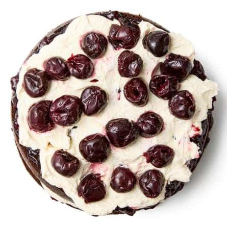 Felicity Cloake’s black forest gateau 09b – finish with a voluptuous layer of cream and cherries.