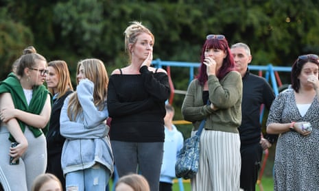 Members of the public attend a vigil near to the scene in Chandos Crescent, Killamarsh, near Sheffield, where four people were found dead on Sunday. 