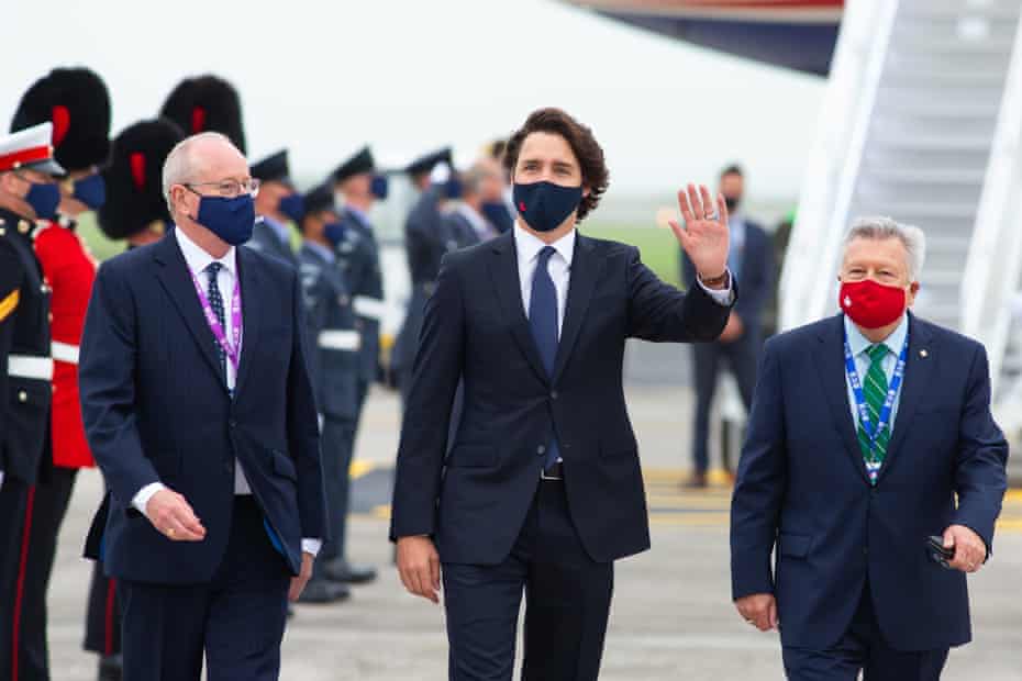 Justin Trudeau, Prime Minister of Canada, waves to the media on arrival at Newquay Airport.