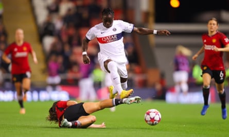 Tabitha Chawinga takes on Maya Le Tissier of Manchester United during the first leg of their Champions League tie
