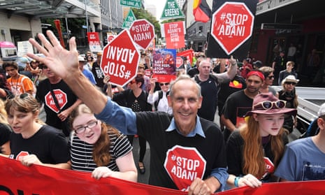 Former Greens leader Bob Brown leads a protest march against Adani’s Carmichael coalmine through Brisbane