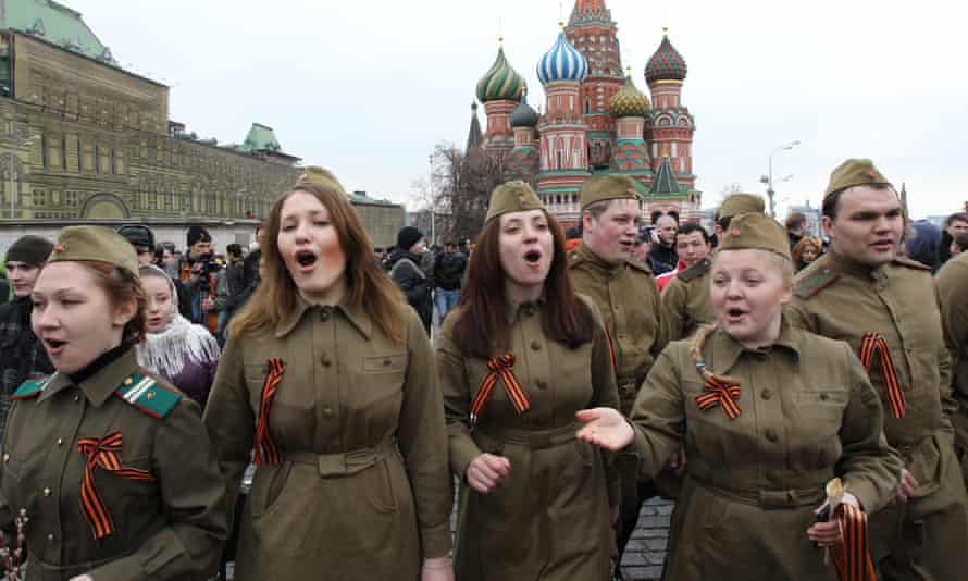 Kremlin-backed youth movement activists sing at an anti-Putin protest in 2012 in Moscow.