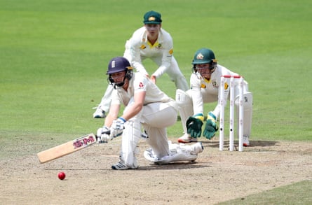 England's Heather Knight bats during the 2019 Ashes Test as Lanning and Healy look on.