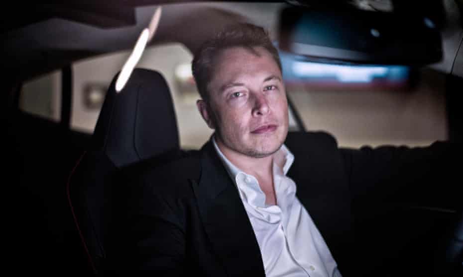 Elon Musk inside one of his company’s electric cars in London. 