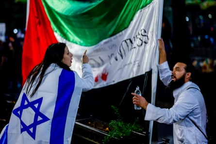 Pro-Israel and pro-Palestine protesters face off during a demonstration in Georgia.