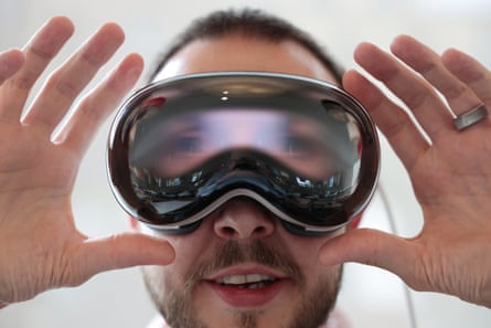 The EyeSight feature of the Apple Vision Pro displaying the wearer’s eyes on the outside screen.