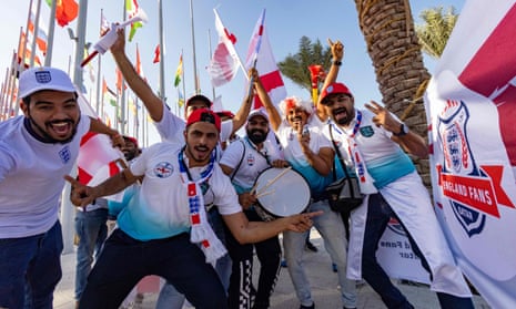 England fans greet the team in Doha