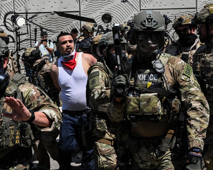 Trump changes course on Epstein files; administration sues California over mask ban – as it happened