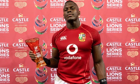 Maro Itoje is presented with the player of the match award in Cape Town.