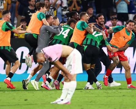Sassuolo celebrate after Vasilije Adzic’s dramatic stoppage-time winner against Juventus.