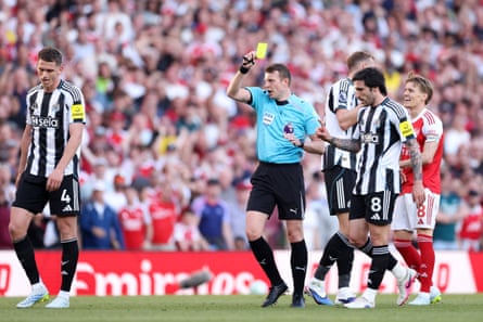 Sam Barrott shows Nick Pope (not pictured) a yellow card during Arsenal’s win over Newcastle.