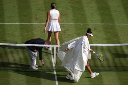 Naomi Osaka starts to shed her kimono after warming up against Aryna Sabalenka