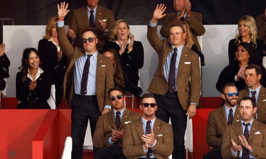 Team USA’s Justin Thomas and Jordan Spieth wave to the crowd during the opening ceremony.