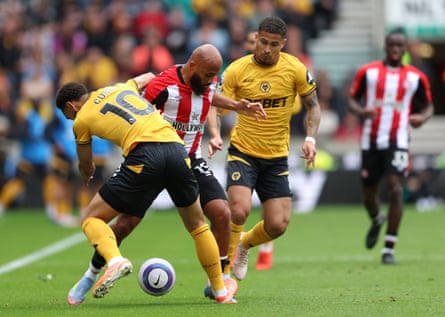 Bryan Mbeumo and Matheus Cunha tussle for the ball in the final game of the Premier League season.