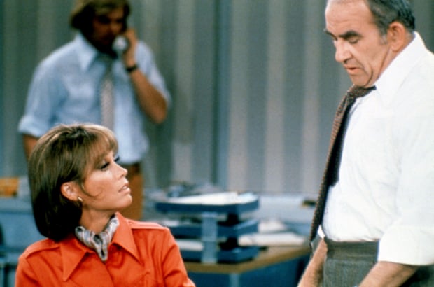Ed Asner as Lou Grant, with Mary Tyler Moore, in The Mary Tyler Moore Show.