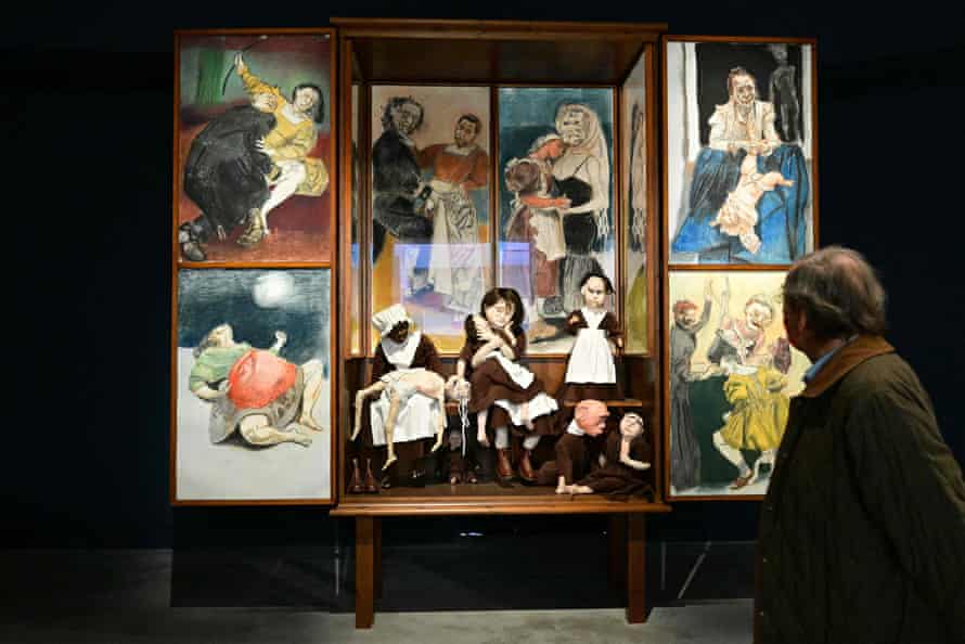 A visitor views Oratorio, 2009, by Paula Rego.