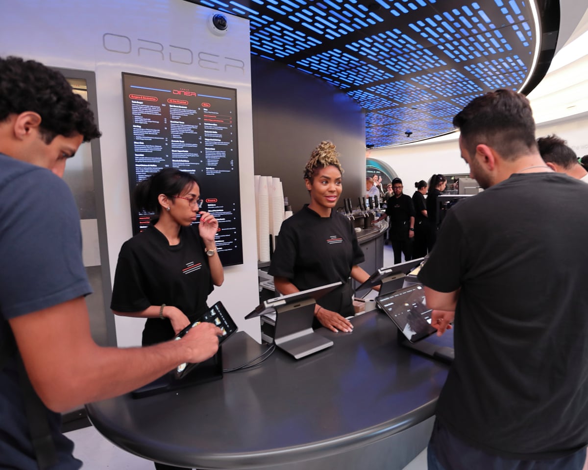 Cybertruck boxes and tacos: Elon Musk opens 'retro futuristic' Tesla Diner  in LA | US news | The Guardian