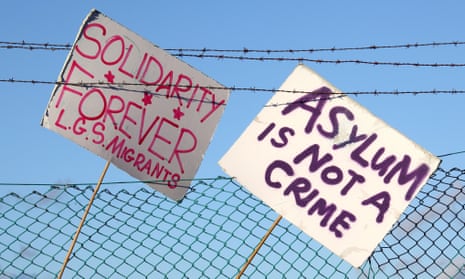 Pro-asylum protest placards