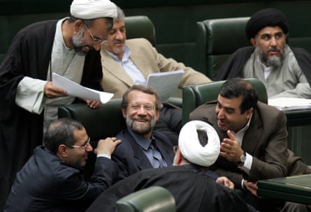 Surrounded by lawmakers in 2006, Ali Larijani, center, was then Iran’s lead nuclear negotiator, and secretary of supreme national security council.