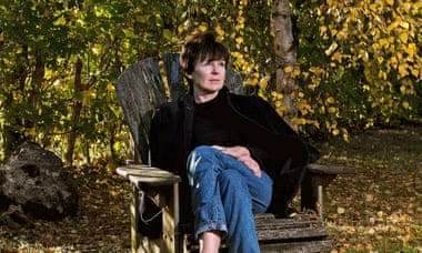 Olivia Laing sitting in her garden