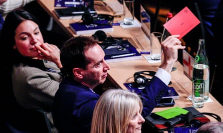 Mark Bullingham, the FA’s chief executive, holds a red card in the air at February’s Uefa congress.