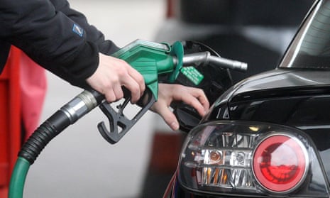 Person using a petrol pump