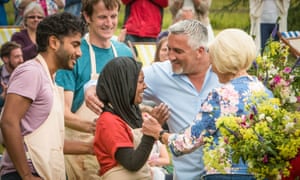 Nadiya is congratulated by judges Mary Berry and Paul Hollywood after being crowned Bake Off champion 2015.
