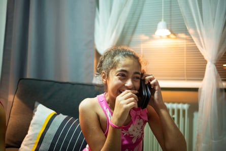 Cidra calling her mother in Syria by Olivier Jobard.