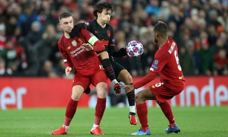 João Félix tries to progress despite the close attention of Liverpool’s Jordan Henderson and Georginio Wijnaldum.