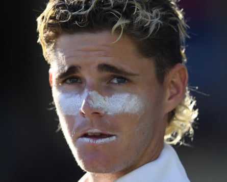 Jacob Bethell of England looks on