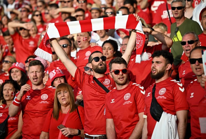 Denmark fans cheer their team.