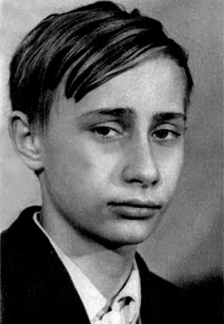 A black and white image of a young Vladimir Putin