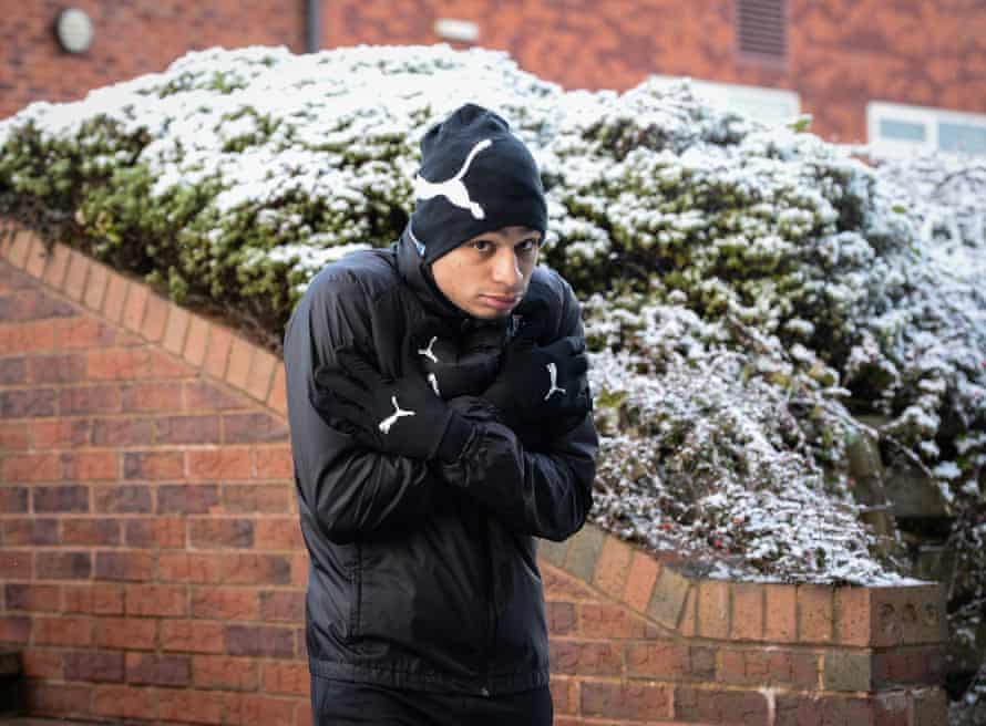 Jacob Murphy walks outside in the snow during a Newcastle training session on Thursday.