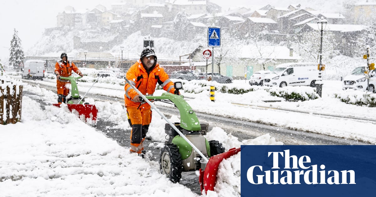 Laughing royals, penitents and snowstorms: photos of the day Thursday