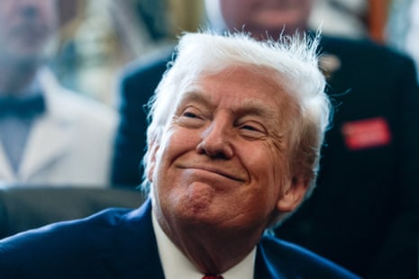 US President Donald Trump sits in the Oval Office at the White House in Washington, D.C., US, December 18, 2025.