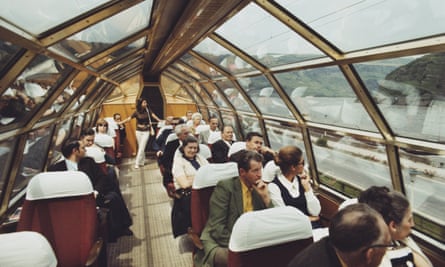 Passengers on a Trans Europe Express train travelling beside the River Rhine near Mainz in West Germany in 1971