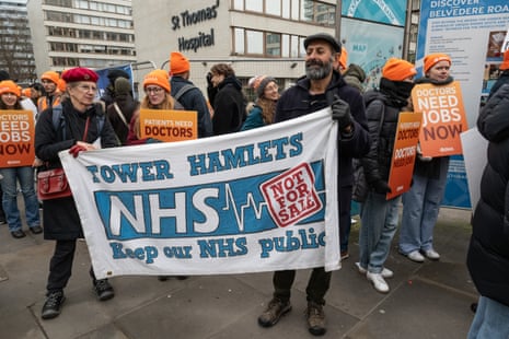 Resident doctors on their picket line at Guys & St Thomas' hospital in Westminster on 17 December 2025.