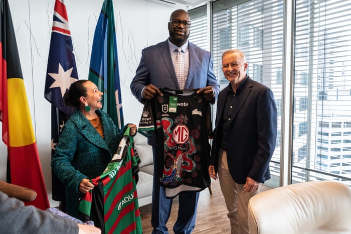 Linda Burney, Shaq and Anthony Albanese exchange gifts before their press conference