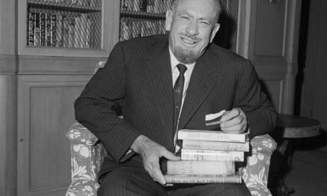 John Steinbeck with a stack of books
