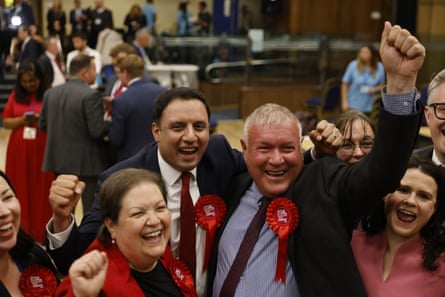 Davy Russell celebrates with Anas Sarwar, the Scottish Labour leader