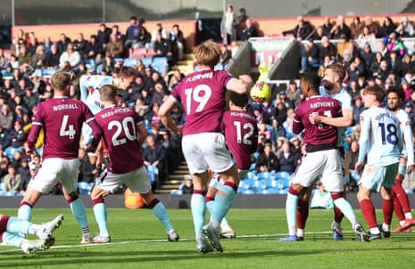 Mikkel Damsgaard heads the Bees into the lead at Turf Moor.
