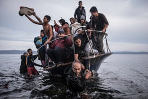 Nothing left to lose … migrants arrive at the Greek island of Lesbos, in a shot by Sergey Ponomarev.