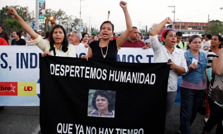 Lidia Marcela Zuniga Caseres, center, daughter of Berta Cáceres, leads the march to demand justice over the murder of her mother, in Tegucigalpa, Honduras, Friday 1 April.