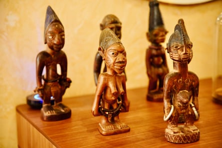 A collection of small carved African figures