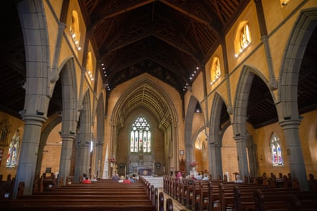 Inside view of St Patrick’s cathedral in Ballarat showing a few people sitting towards the front