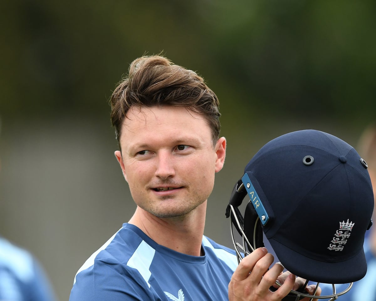 Cricketer Aneurin Donald holds his batting helmet during training with England
