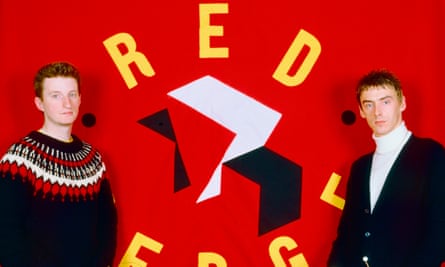 Billy Bragg and Paul Weller in front of a Red Wedge flag