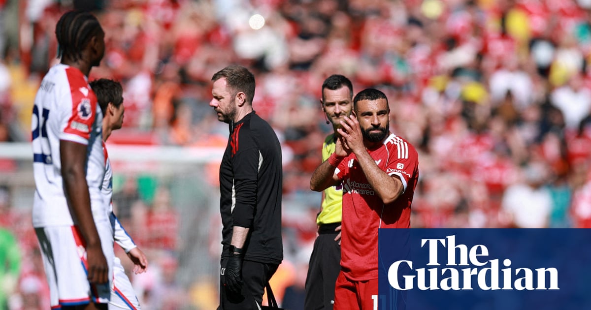Mohamed Salah limps off injured in Liverpool’s win against Crystal Palace